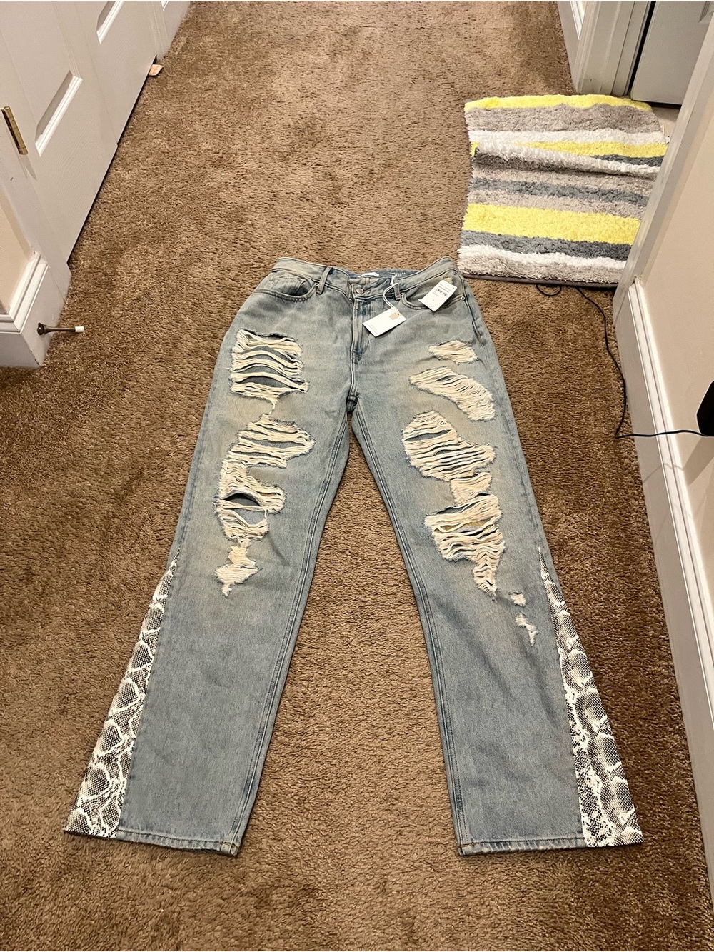 The Khloe Jean Blue Distressed Jeans with Snake-Print Inset